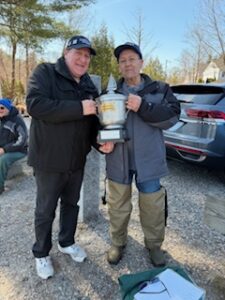 RD John Whalen gives Ice Bucket Trophy to winner Greg LaPlante